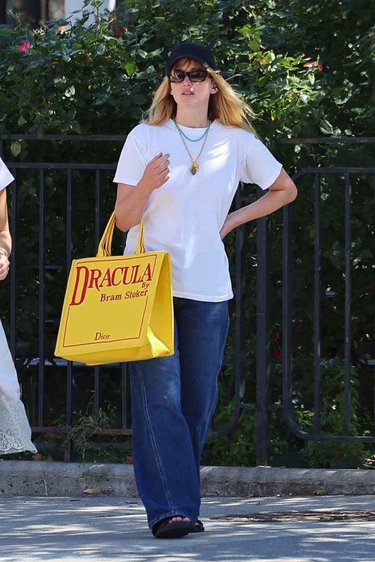 Jennifer Lawrence carrying Dior’s Dracula Book Tote, photographed in New York in August 2025.